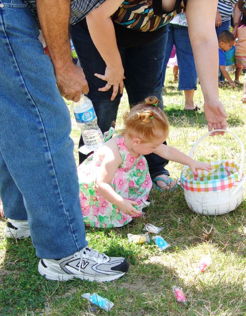 photo of girl hunting for eggs